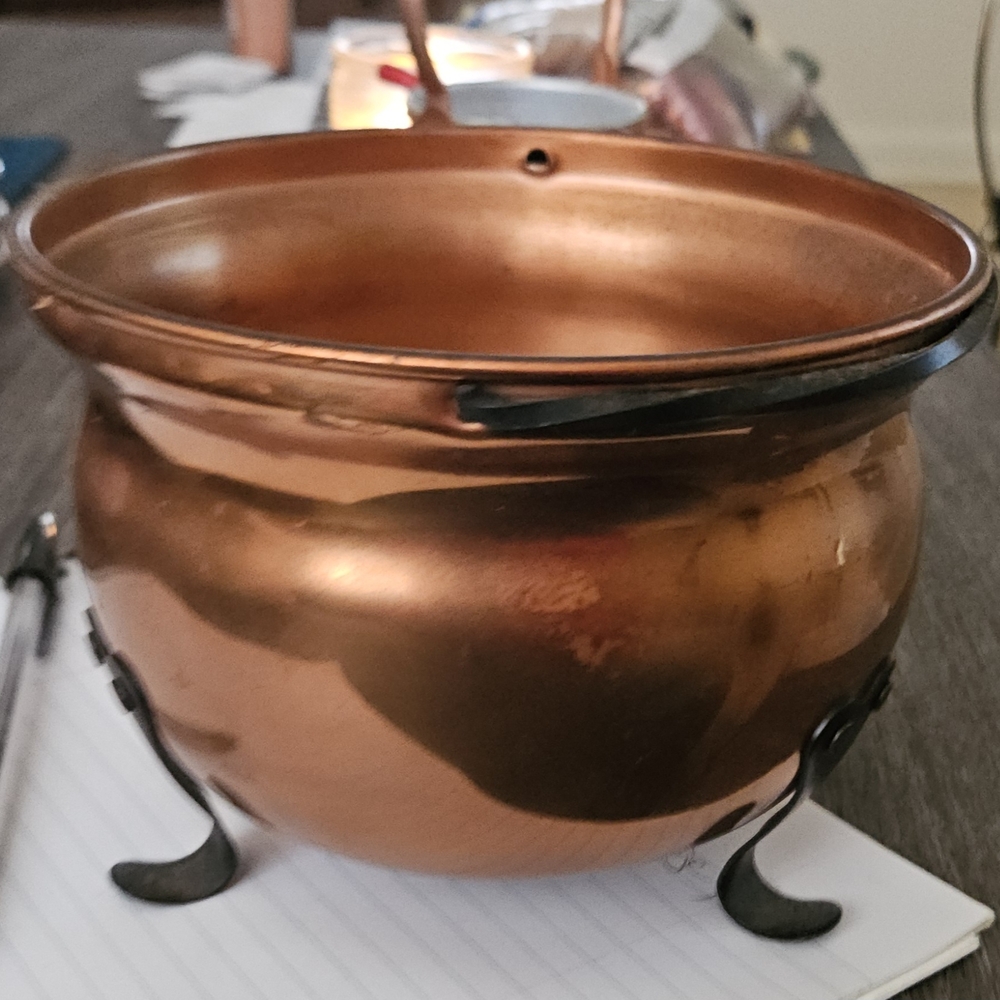 Elegant Copper Pot with Black Handles
